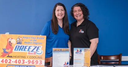Kayla and Kari of BreezeTech at the company's community event booth