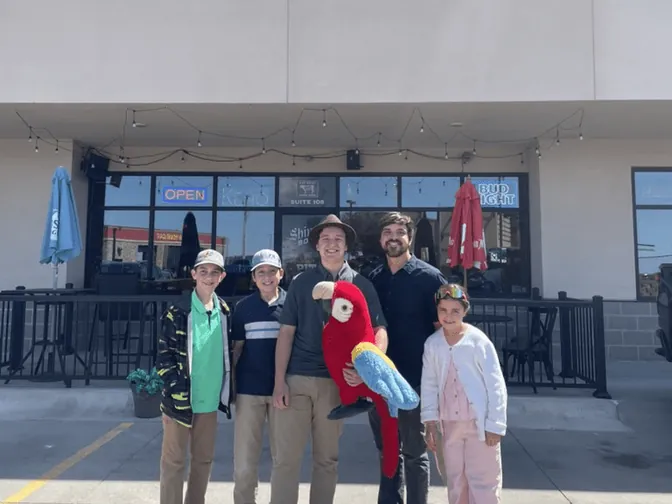 The BreezeTech family outside The Pit BBQ Lounge