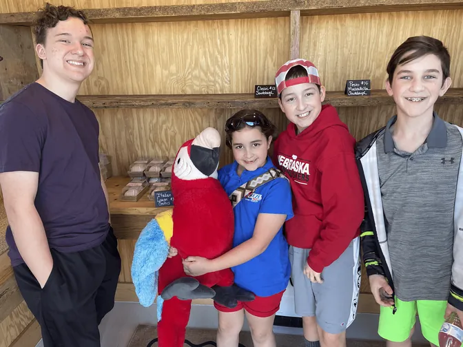 Kids with Max the Macaw at The Bread Barn in Papillion