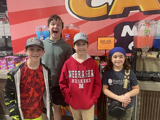 Kids smiling at Baker’s Candies in Greenwood, Nebraska
