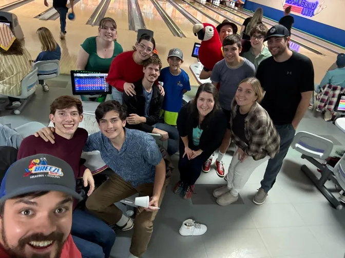 The BreezeTech crew and friends at Mockingbird Lanes for bowling night