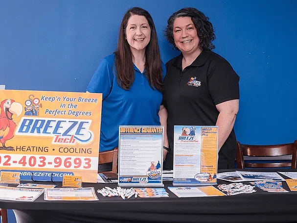Kayla and Kari at the BreezeTech booth at the SBOA Spring Expo in Omaha