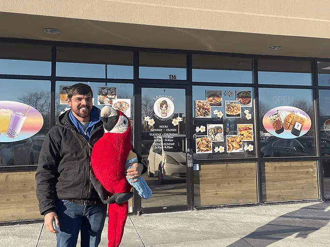 Outside Sabaidee Thai Lao Cuisine in Bellevue with Max the Macaw