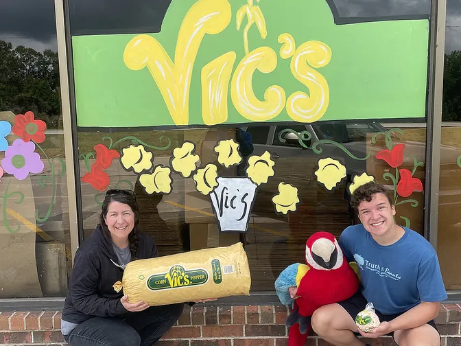 Visiting Vic’s Corn Popper in Millard with Max the Macaw