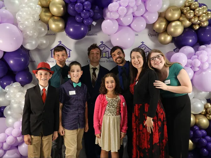 The family dressed up at Open Door Mission’s 70th anniversary celebration