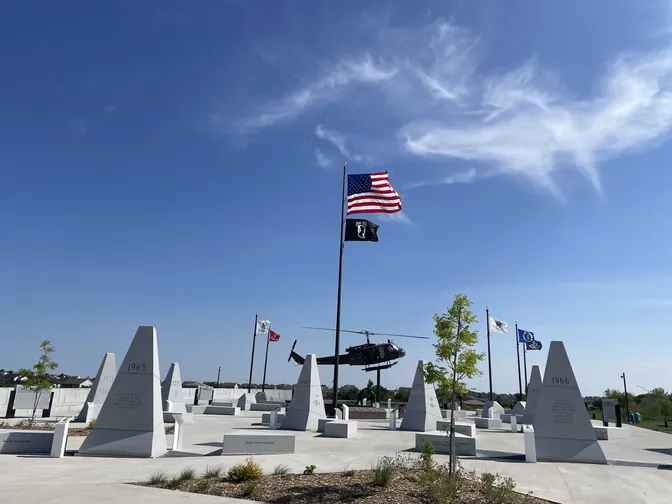 The Nebraska Vietnam Veterans Memorial in Papillion under a blue sky