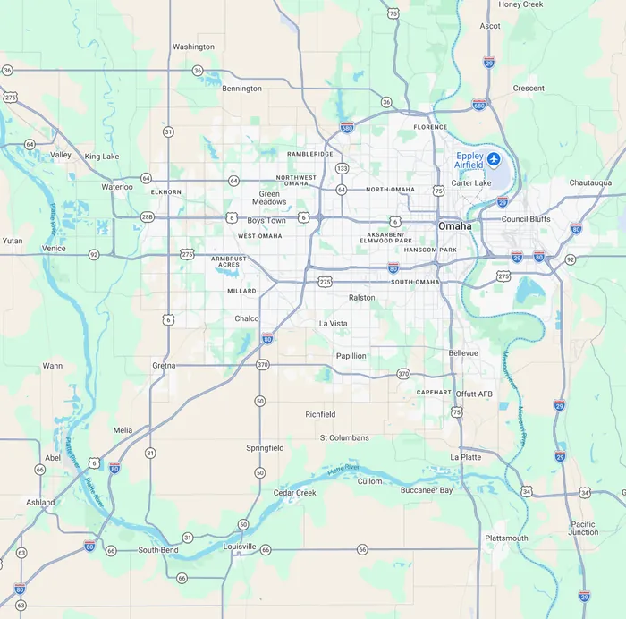 Map of the Omaha metro showing the BreezeTech Heating and Cooling service area around Papillion, including Omaha, Elkhorn, Bennington, Gretna, Chalco, La Vista, Bellevue and Springfield