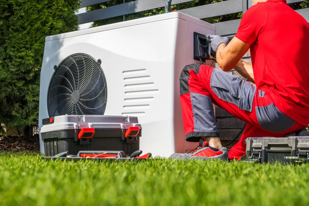 HVAC tech installing a swimming pool heater